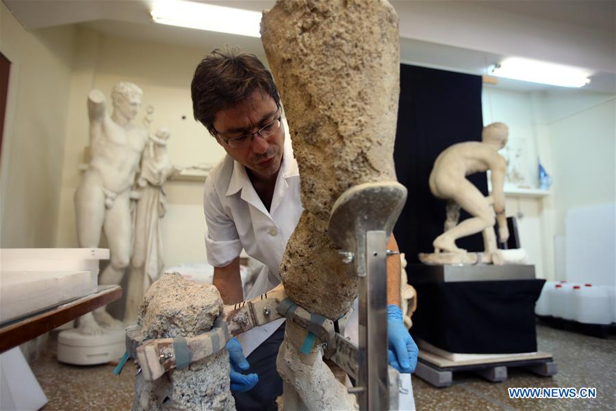 GREECE-ATHENS NATIONAL ARCHAEOLOGICAL MUSEUM-CONSERVATORS