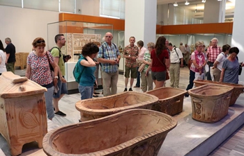 Tourists visit Heraklion Archaeological Museum in Crete, Greece