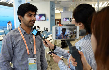 In pics: journalists at SCO Qingdao summit